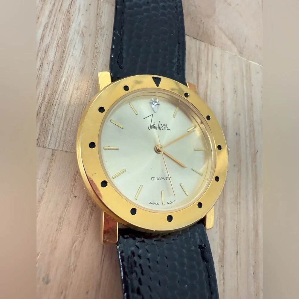 Vintage John weitz gold tone black leather watch NEW BATTERY